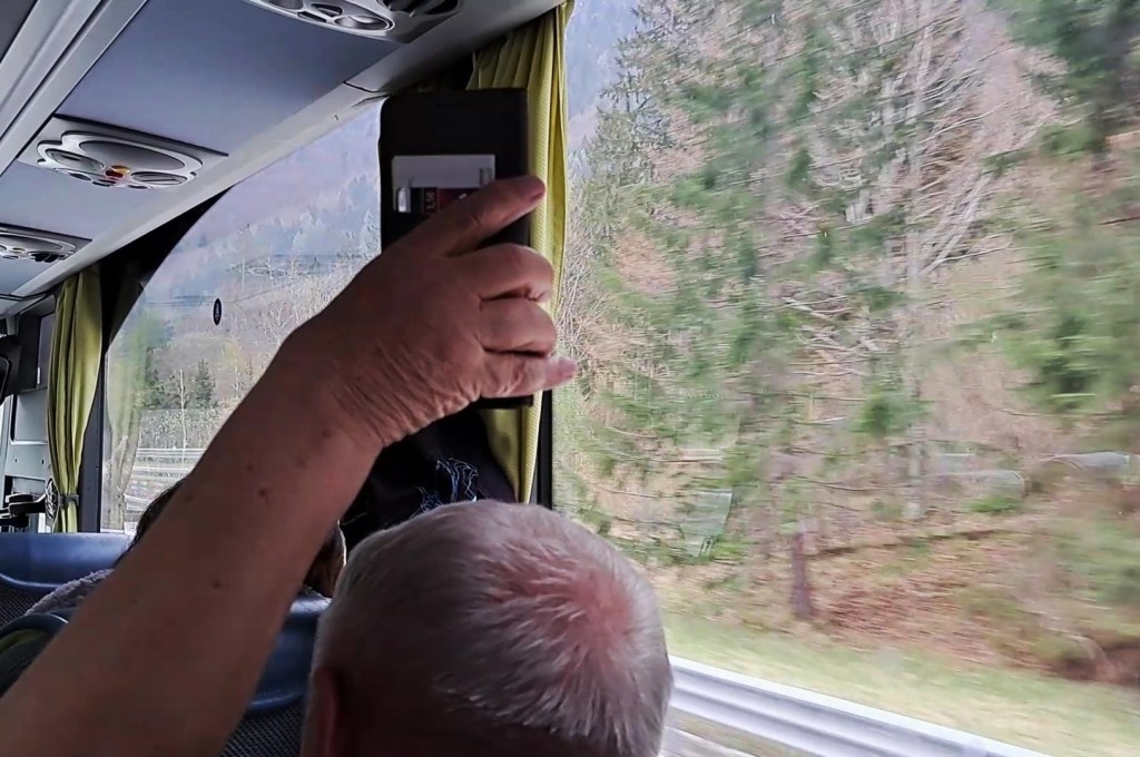 Grandpa sharing the trip via cellphone