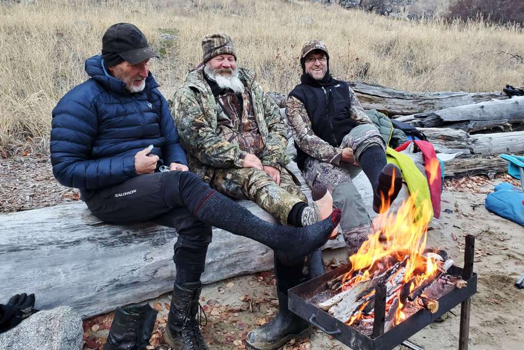 Laughing by the campfire on the Middle Fork in November
